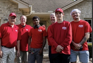 The local FISH Window Cleaning crew gathered outside