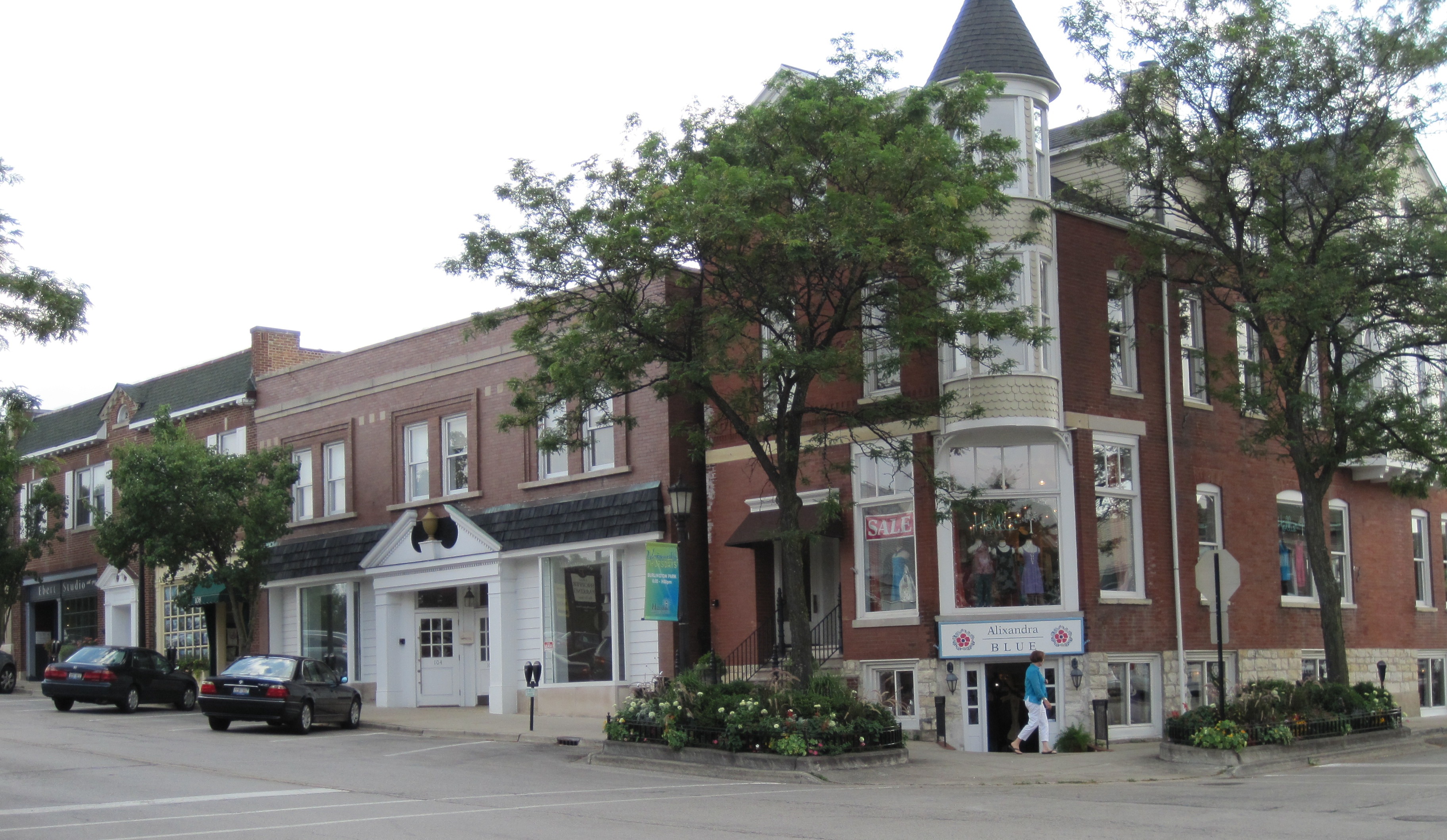 Historic storefronts and mature trees in downtown Hinsdale